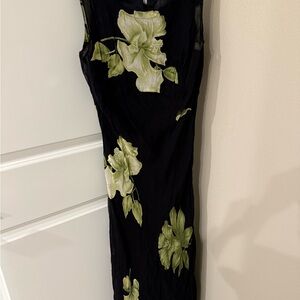 Chic Black Maxi Dress with Green Floral Accents